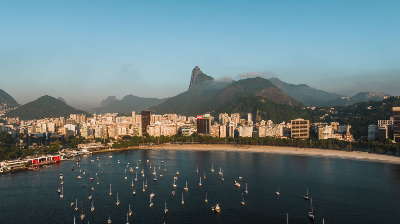 The Best Beaches in Rio de Janeiro (Ranked Honestly) Discover the stunning view of Rio de Janeiro's coastline, featuring iconic mountains and vibrant cityscape.